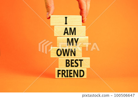 I am my own best friend symbol. Concept words I am my own best friend on wooden blocks on a beautiful orange table orange background. Businessman hand. Business i am my own best friend concept. I am my own best friend symbol. Concept words I am my own best friend on wooden blocks on a beautiful orange table orange background. Businessman hand. Business i am my own best friend concept. 100506647
