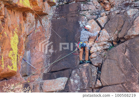 Close up shot of climber climbing in the Wichita Mountains National Wildlife Refuge 100508219