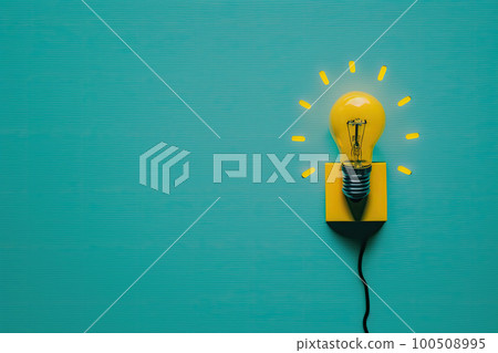 flat lay photo of yellow bulb on turquoise blue background. Illustration AI Generative 100508995