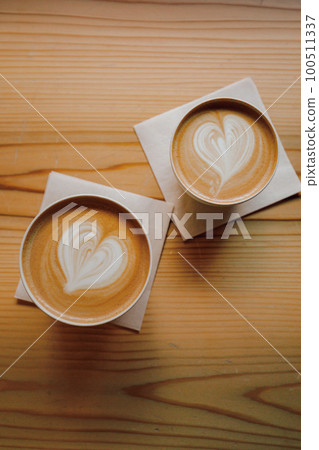 Cafe latte and heart latte art at a stylish cafe in Kyoto 100511337