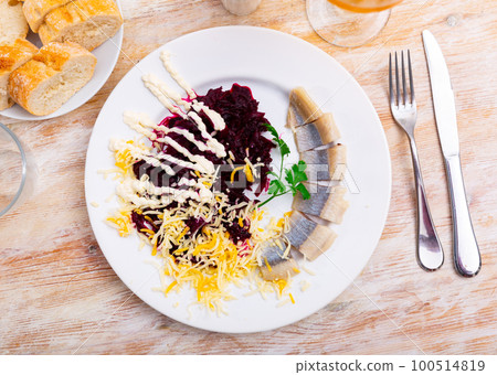 Appetizing beetroot with cheese and herring 100514819