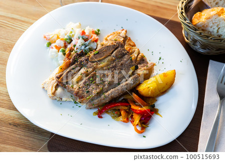 Plate of grilled various types of meat 100515693