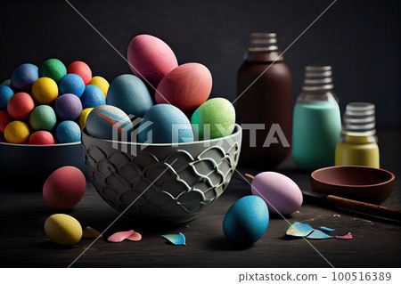 colorful easter eggs in a white bowl on a wooden table with milk bottles and paintbrushs nearby around it colorful easter eggs in a white bowl on a wooden table with milk bottles and paintbrushs nearby around it 100516389