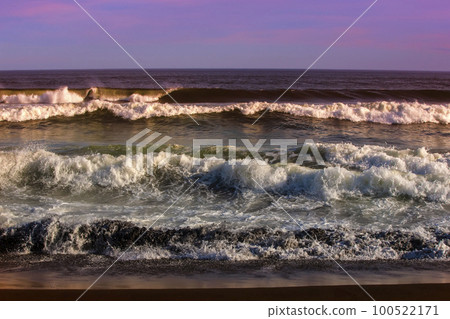 Waves in the Pacific Ocean near the coast of the Kamchatka Peninsula at sunset Waves in the Pacific Ocean near the coast of the Kamchatka Peninsula at sunset 100522171