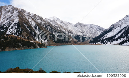 A mountain lake with blue water in winter A mountain lake with blue water in winter 100523908