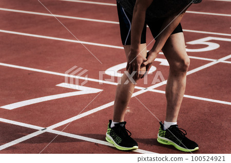 Runner track and field knee injury 100524921