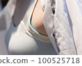 Woman changing clothes underwear shirt 100525718