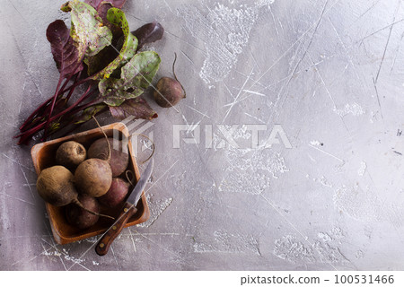 Fresh organic beet, beetroot. Grey rustic wooden background. Fresh organic beet, beetroot. Grey rustic wooden background. 100531466