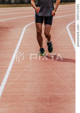 Runner track and field 100532391