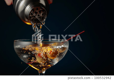 Martini with green olives. 100532942