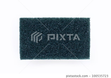 Green scrub sponge on blue background. Green scrub sponge on blue background. 100535723