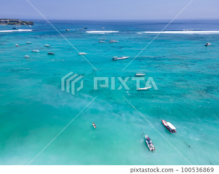 Aerial view of tourist speedboat anchored at Nusa Lembongan 100536869