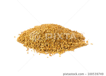 Crumbled bee pollen granules on white background. Crumbled bee pollen granules on white background. 100539749