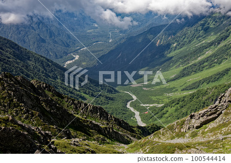 Dakesawa and Kamikochi as seen from the Hotaka mountain range and Tsurione 100544414