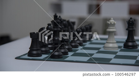 chess pieces on the white surface..Game of Chess. Close Up Playing Chess Game , Success Strategy. 100546297