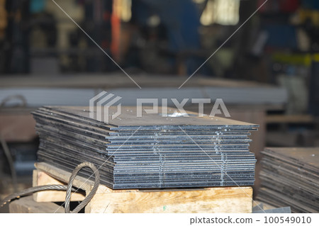 Sheets of metal and blanks in the workshop of a metallurgical plant or a metal working enterprise. Sheets of metal and blanks in the workshop of a metallurgical plant or a metal working enterprise. 100549010
