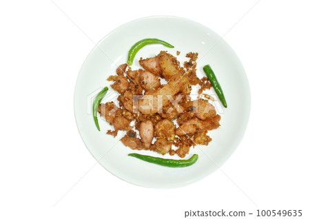fried fermenting pork with garlic and fresh chili on plate fried fermenting pork with garlic and fresh chili on plate 100549635