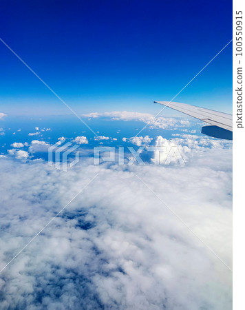 Cloudy sky from porthole Cloudy sky from porthole 100550915
