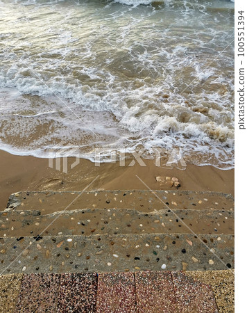 Stone stairs and waves 100551394