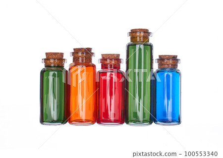 Many filled glass bottles on isolated background Many filled glass bottles on isolated background 100553340