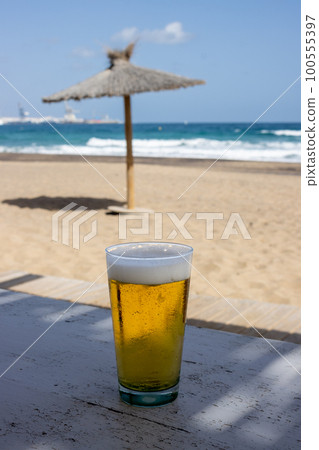 Beer on a beach, Fuerteventura, Canary Islands 100555397