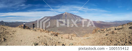 Panoramic wide close up view on colorful volcano pico del teide highest spanish mountain in Tenerife Canary island from mount Alto de Guajara with blue sky background. Horizontal, copy space 100555412