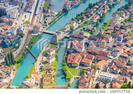 Aerial view over the city of Interlaken in Switzerland. View from Harder Kulm viewpoint Aerial view over the city of Interlaken in Switzerland. View from Harder Kulm viewpoint 100557739