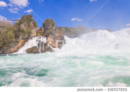 View of Rhine Falls in Schaffhausen canton, Switzerland. Most powerful waterfall in Europe View of Rhine Falls in Schaffhausen canton, Switzerland. Most powerful waterfall in Europe 100557850