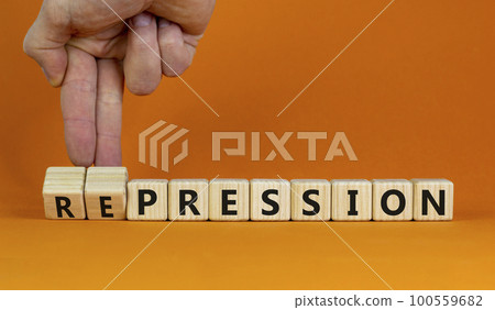 Pression to repression symbol. Businessman turns wooden cubes, changes the word pression to repression. Beautiful orange background. Business, pression to repression concept. Copy space. Pression to repression symbol. Businessman turns wooden cubes, changes the word pression to repression. Beautiful orange background. Business, pression to repression concept. Copy space. 100559682