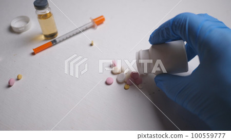 addict's table pills and injection on the black table addict's table pills and injection on the black table 100559777
