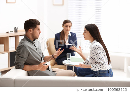Professional psychologist working with couple in office Professional psychologist working with couple in office 100562323