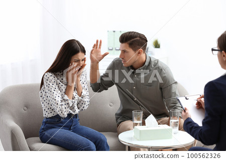 Professional psychologist working with couple in office Professional psychologist working with couple in office 100562326