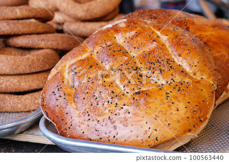 Freshly baked bread on table Freshly baked bread on table 100563440