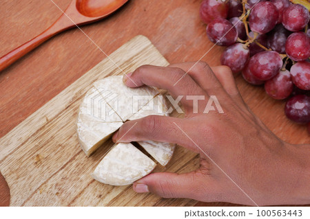 Camembert cheese on a bowl on table Camembert cheese on a bowl on table 100563443
