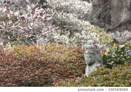 Plum and stone Buddha Plum and stone Buddha 100569089