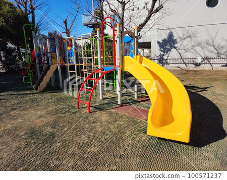 Sunny park and slide 100571237