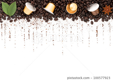 Dark roasted coffee beans setup on white background with copy space. 100577923