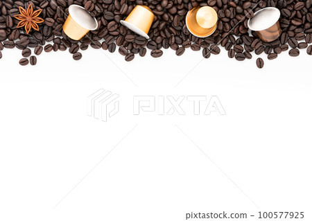 Dark roasted coffee beans setup on white background with copy space. Dark roasted coffee beans setup on white background with copy space. 100577925