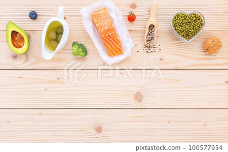 Ketogenic low carbs diet concept. Ingredients for the healthy foods selection setup on wooden background with copy space. 100577954
