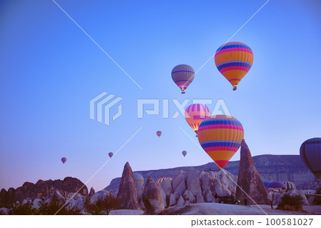 Flying hot air balloons Flying hot air balloons 100581027