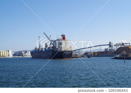 View of cargo ships loading and unloading at Ishinomaki Port View of cargo ships loading and unloading at Ishinomaki Port 100586843