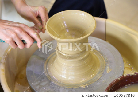 A woman doing ceramics A woman doing ceramics 100587816