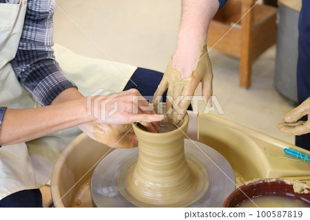 A woman doing ceramics A woman doing ceramics 100587819