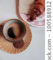 black coffee, cookies and croissant 100588912