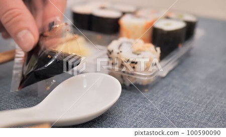 eating sushi in a restaurant, Close Up 100590090
