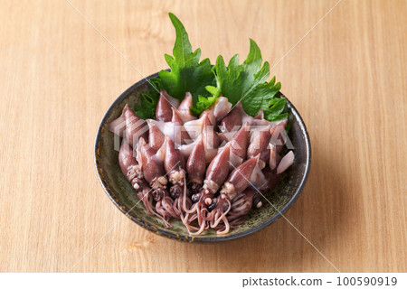 Boiled firefly squid on a plate 100590919