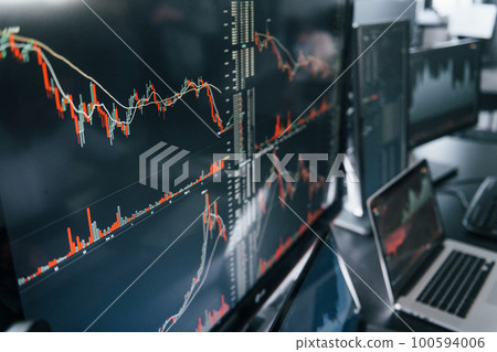 Close up view of computer display. Many of stock graphs. Modern digital money Close up view of computer display. Many of stock graphs. Modern digital money 100594006