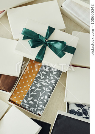 Close up view of gift boxes that lying down. Daytime lighting Close up view of gift boxes that lying down. Daytime lighting 100600348