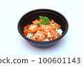 Salmon marinated shoyu or salmon pickled soy sauce and rice in a black tray. Japanese Style or Korean style. on a white background. 100601143