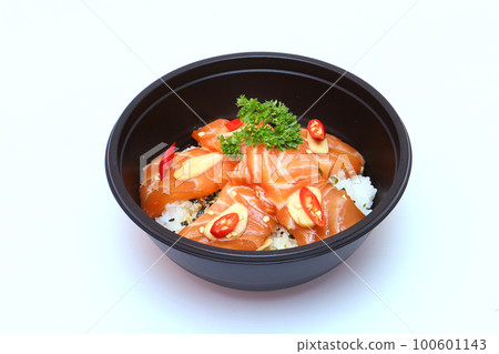 Salmon marinated shoyu or salmon pickled soy sauce and rice in a black tray. Japanese Style or Korean style. on a white background. Salmon marinated shoyu or salmon pickled soy sauce and rice in a black tray. Japanese Style or Korean style. on a white background. 100601143